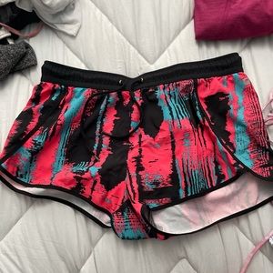Blue and pink workout shorts